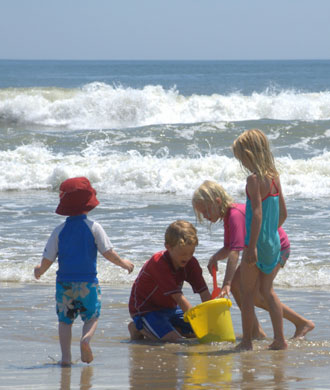 Children playing at the beach